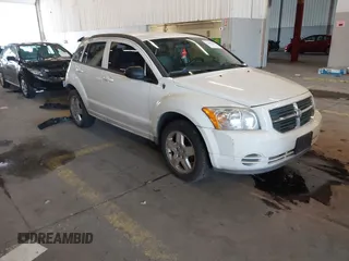 2009 Dodge Caliber SXT with VIN 1B3HB48A89D116734, listed as a IAAI auction lot 41959281 with 209,136 mi miles and . Bid and sale history available at DreamBid. Image 1.