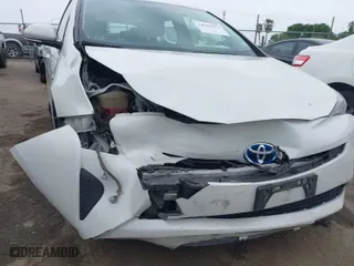 2016 Toyota Prius Two with VIN JTDKBRFU2G3503863, listed as a IAAI auction lot 42035013 with 118,930 mi miles. Bid and sale history available at carsss.com. Image 6.