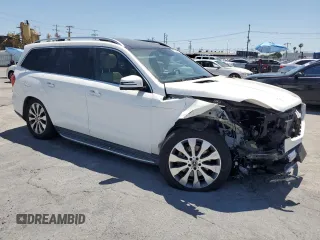 2019 Mercedes-Benz GLS 450 with VIN 4JGDF6EE9KB222613, listed as a Copart auction lot 59233025 with 73,660 mi miles and Salvage title. Bid and sale history available at DreamBid. Image 4.