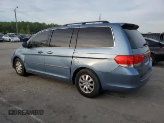 2009 Honda Odyssey EX-L with VIN 5FNRL38759B004710, listed as a Copart auction lot 54210425 with 171,674 mi miles and Salvage Title. Bid and sale history available at DreamBid. Image 2.