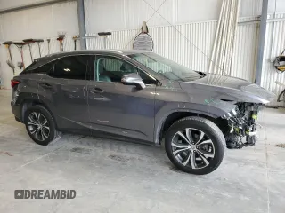 2016 Lexus RX 350 with VIN 2T2BZMCA1GC038794, listed as a Copart auction lot 64048765 with 114,205 mi miles and Salvage title. Bid and sale history available at DreamBid. Image 4.