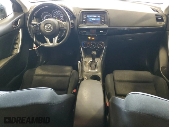 2014 Mazda CX-5 Touring z VIN JM3KE4CY5E0393463, wystawiony jako Copart lot #57776665 z przebiegiem 91 565 mil mil oraz Szkoda całkowita • Salvage title. Historia ofert i sprzedaży dostępna na DreamBid. Obrazek 8.