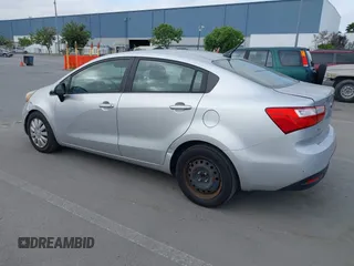 2014 Kia Rio LX with VIN KNADM4A3XE6363851, listed as a IAAI auction lot 42111189 with 144,122 mi miles and . Bid and sale history available at DreamBid. Image 3.