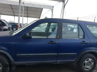 2004 Honda CR-V LX with VIN JHLRD684X4C023539, listed as a IAAI auction lot 42032809 with 186,056 mi miles and . Bid and sale history available at carsss.com. Image 14.