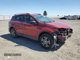 2018 Toyota RAV4 LE with VIN 2T3BFREV9JW852635, listed as a Copart auction lot 59807005 with 60,519 mi miles and Salvage title. Bid and sale history available at DreamBid. Image 4.