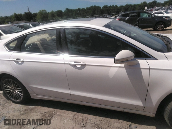 2016 Ford Fusion SE with VIN 3FA6P0H9XGR363785, listed as a IAAI auction lot 42312744 with 151,919 mi miles and . Bid and sale history available at DreamBid. Image 13.