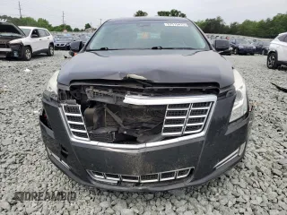 2013 Cadillac XTS Premium z VIN 2G61S5S37D9169935, wystawiony jako Copart lot #57515415 z przebiegiem 122 144 mil mil oraz Szkoda całkowita • Salvage title. Historia ofert i sprzedaży dostępna na DreamBid. Obrazek 5.