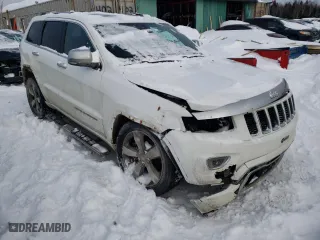 2014 Jeep Grand Cherokee Overland with VIN 1C4RJFCM9EC367863, listed as a Copart auction lot 43227105 with 221,273 mi miles and Salvage Title. Bid and sale history available at carsss.com. Image 4.