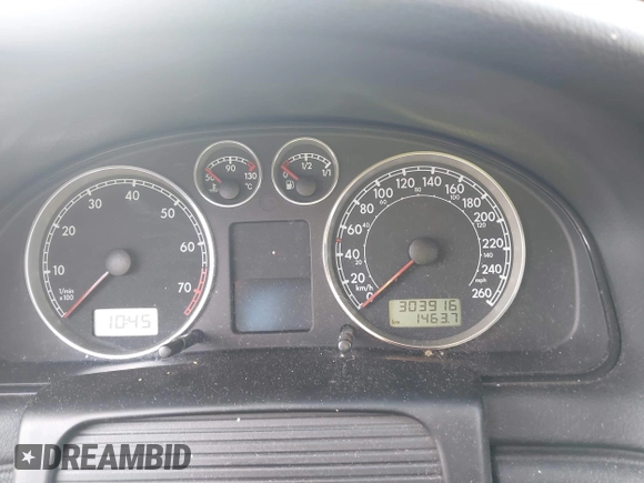 2002 Volkswagen Passat z VIN WVWPD23B42P070347, wystawiony jako IAAI lot #41546173 z przebiegiem 303 916 mil mil oraz . Historia ofert i sprzedaży dostępna na DreamBid. Obrazek 7.