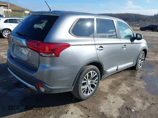 2016 Mitsubishi Outlander SE with VIN JA4AZ3A30GZ039451, listed as a IAAI auction lot 41839444 with 151,357 mi miles and . Bid and sale history available at DreamBid. Image 4.