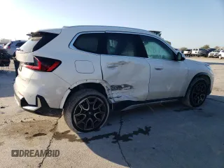2025 BMW X1 xDrive28i with VIN WBX73EF08S5034108, listed as a Copart auction lot 49151215 with 5,043 mi miles and Salvage Title. Bid and sale history available at carsss.com. Image 3.