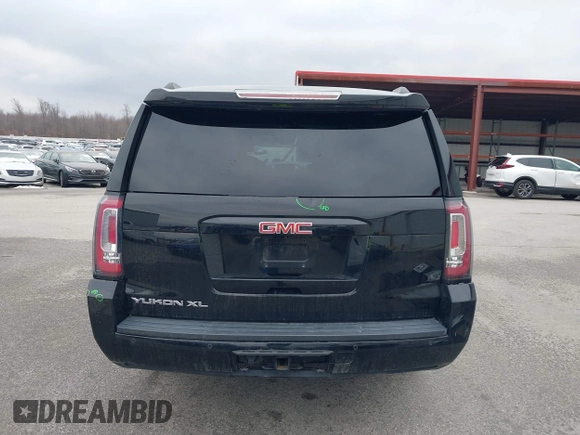 2015 GMC Yukon XL SLT with VIN 1GKS2HKC6FR746809, listed as a IAAI auction lot 41559570 with 144,401 mi miles. Bid and sale history available at carsss.com. Image 17.