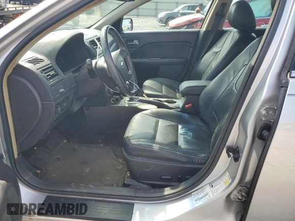 2012 Ford Fusion SEL with VIN 3FAHP0JG9CR157630, listed as a Copart auction lot 61682695 with 154,281 mi miles and Salvage title. Bid and sale history available at DreamBid. Image 7.