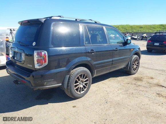 2006 Honda Pilot EX-L with VIN 2HKYF18596H512441, listed as a IAAI auction lot 41842107 with 248,844 mi miles. Bid and sale history available at carsss.com. Image 4.