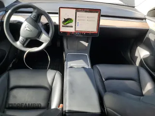 2023 Tesla Model 3 with VIN 5YJ3E1EAXPF708001, listed as a Copart auction lot 57252735 with 71,579 mi miles and Salvage title. Bid and sale history available at DreamBid. Image 8.