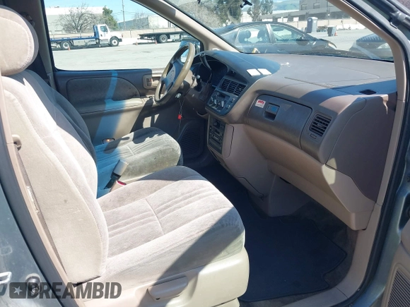 1999 Toyota Sienna LE with VIN 4T3ZF13C1XU097653, listed as a IAAI auction lot 41765274 with 236,625 mi miles. Bid and sale history available at carsss.com. Image 5.
