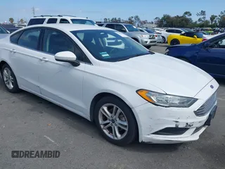 2018 Ford Fusion SE z VIN 3FA6P0HD3JR260607, wystawiony jako IAAI lot #42440709 z przebiegiem 156 771 mil mil oraz . Historia ofert i sprzedaży dostępna na DreamBid. Obrazek 1.