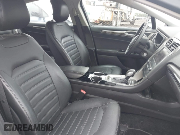 2013 Ford Fusion SE Hybrid with VIN 3FA6P0LU0DR128688, listed as a IAAI auction lot 42580852 with 137,421 mi miles and . Bid and sale history available at DreamBid. Image 5.