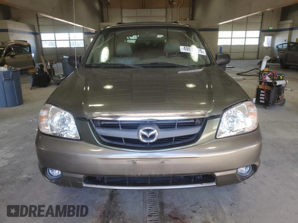 2002 Mazda Tribute LX with VIN 4F2YU09142KM39082, listed as a Copart auction lot 49973375 with 128,002 mi miles and Clean Title. Bid and sale history available at carsss.com. Image 5.