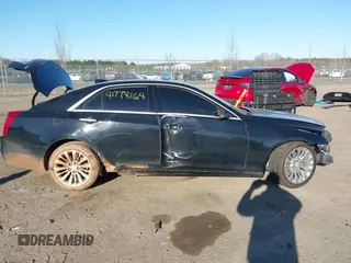 2019 Cadillac CTS Luxury AWD z VIN 1G6AX5SX8K0129858, wystawiony jako IAAI lot #41778164 z przebiegiem 89 695 mil mil oraz . Historia ofert i sprzedaży dostępna na DreamBid. Obrazek 13.