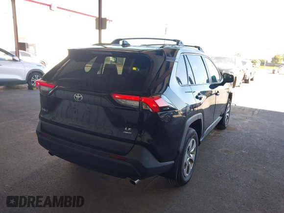 2021 Toyota RAV4 LE with VIN 2T3F1RFV1MC195589, listed as a IAAI auction lot 42509900 with 61,671 mi miles and . Bid and sale history available at DreamBid. Image 4.