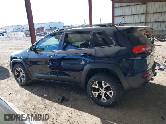 2015 Jeep Cherokee Trailhawk with VIN 1C4PJMBB1FW520649, listed as a IAAI auction lot 41991904 with 168,533 mi miles and . Bid and sale history available at DreamBid. Image 15.