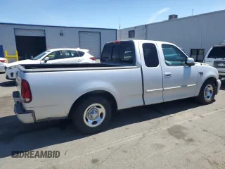 1999 Ford F-150 XL с VIN 1FTRX17L1XKC25356, выставлен на аукционе Copart как лот 65149275 с пробегом 205 482 миль миль и Чистый • Clean title. История ставок и продаж доступна на DreamBid. Изображение 3.