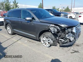 2019 Audi Q7 Premium with VIN WA1AHAF71KD016656, listed as a IAAI auction lot 41545261 with 63,394 mi miles and . Bid and sale history available at DreamBid. Image 1.