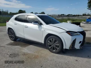 2022 Lexus UX with VIN JTHE3JBHXN2048153, listed as a Copart auction lot 67904334 with 50,346 mi miles and Salvage Title. Bid and sale history available at carsss.com. Image 4.