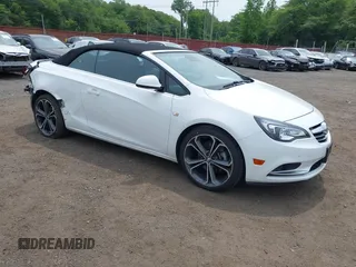 2016 Buick Cascada Premium with VIN W04WT3N57GG148293, listed as a IAAI auction lot 42476140 with 123,854 mi miles and . Bid and sale history available at DreamBid. Image 1.