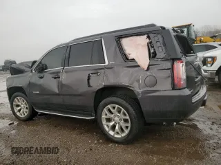 2015 GMC Yukon SLT with VIN 1GKS2BKC1FR732961, listed as a Copart auction lot 49898945 with 0 mi miles and Salvage Title. Bid and sale history available at carsss.com. Image 2.