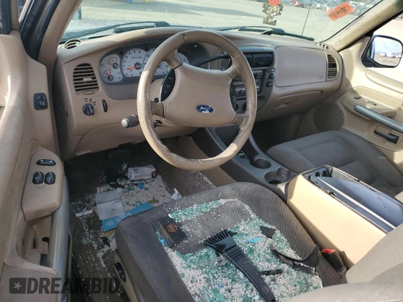 2001 Ford Explorer Sport with VIN 1FMYU60E01UA19935, listed as a Copart auction lot 49678955 with 90,090 mi miles and Salvage title. Bid and sale history available at DreamBid. Image 8.