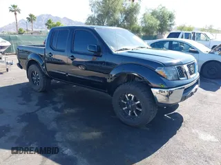 2006 Nissan Frontier SE z VIN 1N6AD07WX6C458569, wystawiony jako IAAI lot #42317531 z przebiegiem 198 485 mil mil oraz . Historia ofert i sprzedaży dostępna na DreamBid. Obrazek 1.