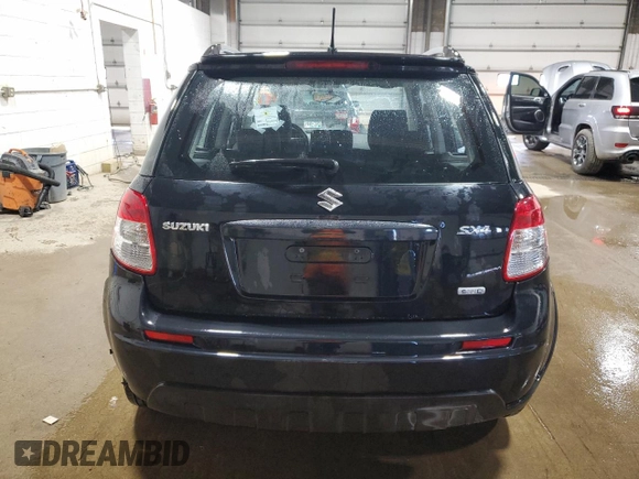 2009 Suzuki SX4 Touring AWD with VIN JS2YB417496202243, listed as a Copart auction lot 53842055 with 70,544 mi miles and Salvage Title. Bid and sale history available at DreamBid. Image 6.