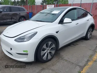 2023 Tesla Model Y Long Range with VIN 7SAYGAEE9PF702910, listed as a IAAI auction lot 42199519 with 91,094 mi miles and . Bid and sale history available at DreamBid. Image 20.