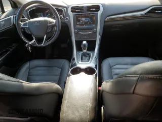 2015 Ford Fusion SE Hybrid with VIN 3FA6P0LU1FR136933, listed as a Copart auction lot 61915914 with 153,614 mi miles and Salvage Title. Bid and sale history available at carsss.com. Image 8.