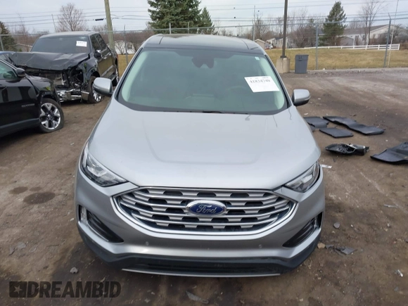 2021 Ford Edge Titanium z VIN 2FMPK4K94MBA32297, wystawiony jako IAAI lot #41834740 z przebiegiem 45 908 mil mil oraz . Historia ofert i sprzedaży dostępna na DreamBid. Obrazek 12.