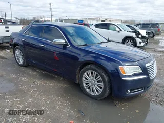 2014 Chrysler 300 C with VIN 2C3CCAKG2EH273209, listed as a IAAI auction lot 41955858 with 112,742 mi miles and . Bid and sale history available at carsss.com. Image 1.