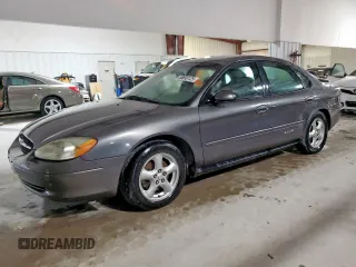 2002 Ford Taurus SES Standard z VIN 1FAFP55U72A161401, wystawiony jako Copart lot #55893125 z przebiegiem 128 258 mil mil oraz Czysty tytuł • Clean title. Historia ofert i sprzedaży dostępna na DreamBid. Obrazek 1.