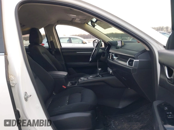 2019 Mazda CX-5 Sport with VIN JM3KFABMXK1655302, listed as a IAAI auction lot 41901293 with 140,369 mi miles and . Bid and sale history available at DreamBid. Image 5.