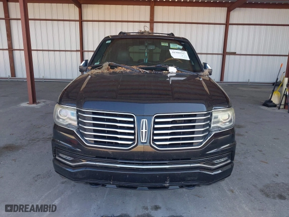 2015 Lincoln Navigator L with VIN 5LMJJ3JT0FEJ12569, listed as a IAAI auction lot 41909517 with 165,631 mi miles. Bid and sale history available at carsss.com. Image 6.