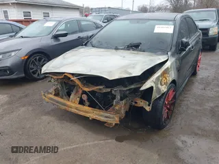 2014 Mitsubishi Lancer GT with VIN JA32U8FW9EU010127, listed as a IAAI auction lot 41182463 with Not Provided miles and . Bid and sale history available at DreamBid. Image 6.