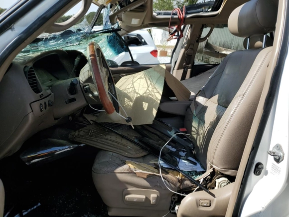 2002 Toyota Sequoia Limited with VIN 5TDZT38A82S079799, listed as a Copart auction lot 51153475 with 357,897 mi miles and Salvage Title. Bid and sale history available at carsss.com. Image 7.