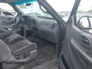 2002 Ford F-150 XL with VIN 1FTRX18W22NA26073, listed as a IAAI auction lot 42126819 with 212,893 mi miles and . Bid and sale history available at DreamBid. Image 5.