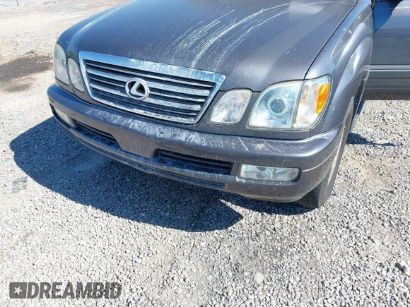2003 Lexus LX with VIN JTJHT00W233532297, listed as a IAAI auction lot 42189676 with 235,992 mi miles. Bid and sale history available at carsss.com. Image 6.