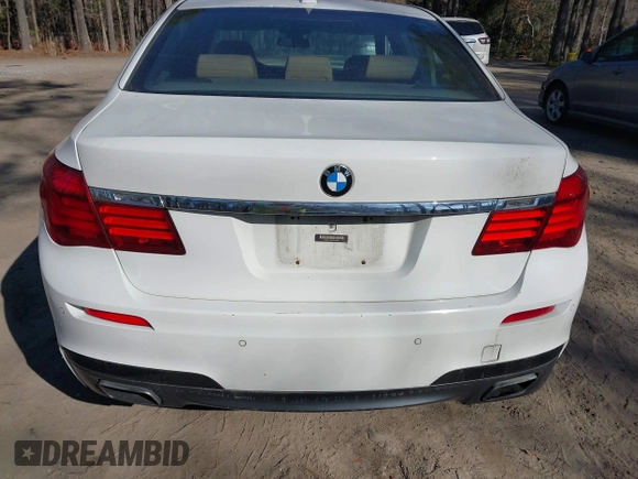 2014 BMW 7 Series 740Li with VIN WBAYE4C59ED138409, listed as a IAAI auction lot 41785423 with 121,687 mi miles. Bid and sale history available at carsss.com. Image 16.