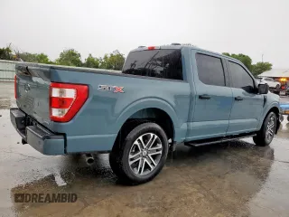 2023 Ford F-150 XL with VIN 1FTEW1CP3PKF86310, listed as a Copart auction lot 60575065 with 29,548 mi miles and Salvage title. Bid and sale history available at DreamBid. Image 3.