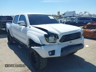 2014 Toyota Tacoma PreRunner z VIN 5TFJU4GN7EX059160, wystawiony jako IAAI lot #41836424 z przebiegiem 146 856 mil mil oraz . Historia ofert i sprzedaży dostępna na DreamBid. Obrazek 1.