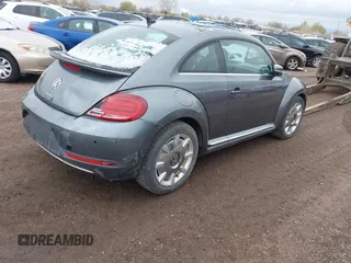 2018 Volkswagen Beetle SE with VIN 3VWJD7AT2JM710412, listed as a IAAI auction lot 41868455 with 1 mi miles. Bid and sale history available at carsss.com. Image 4.