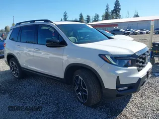 2023 Honda Passport Elite with VIN 5FNYF8H01PB004087, listed as a IAAI auction lot 42045433 with 20,677 mi miles and . Bid and sale history available at carsss.com. Image 1.